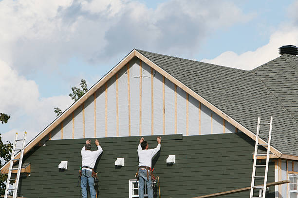 Professional Siding technician working in Sanford, FL